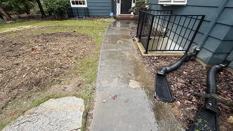 Aging concrete walkway before paver replacement at an Eastmoreland Portland Oregon home