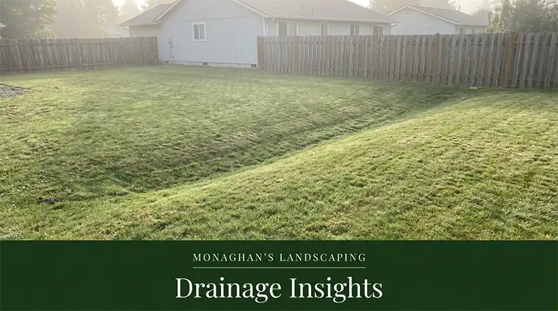 Grass swale drainage in a backyard at a Gladstone Oregon home
